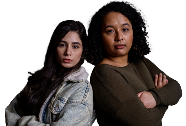 two women standing back to back